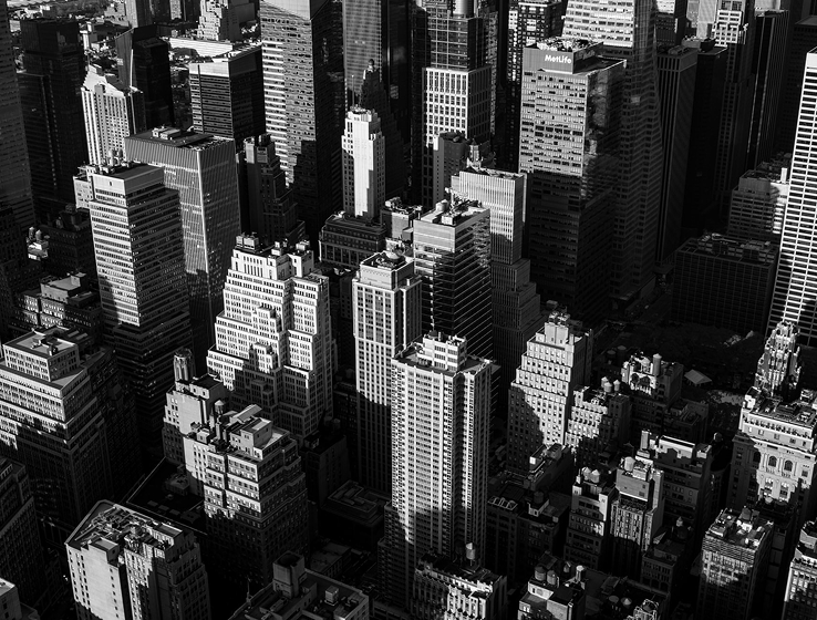 airplane view of tall skyscrapers